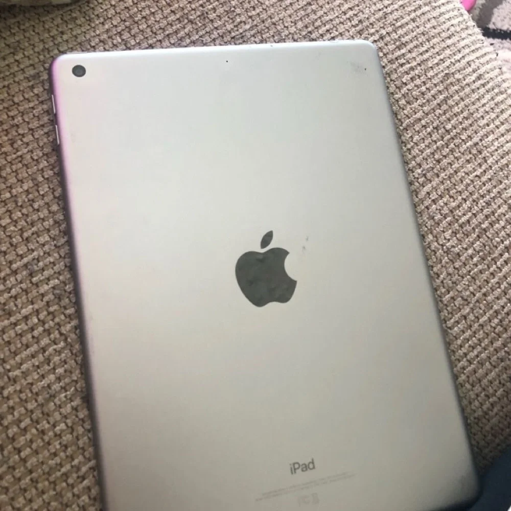 Apple Tablet with Vibrant Red and Blue Display